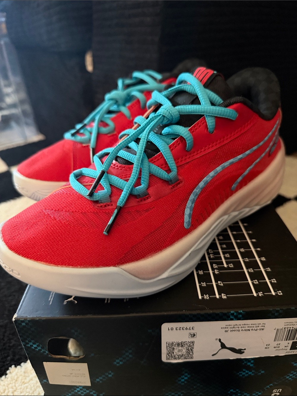 BoysPuma All-Pro Nitro Scoot basketball shoes in a vibrant red and aqua colorway